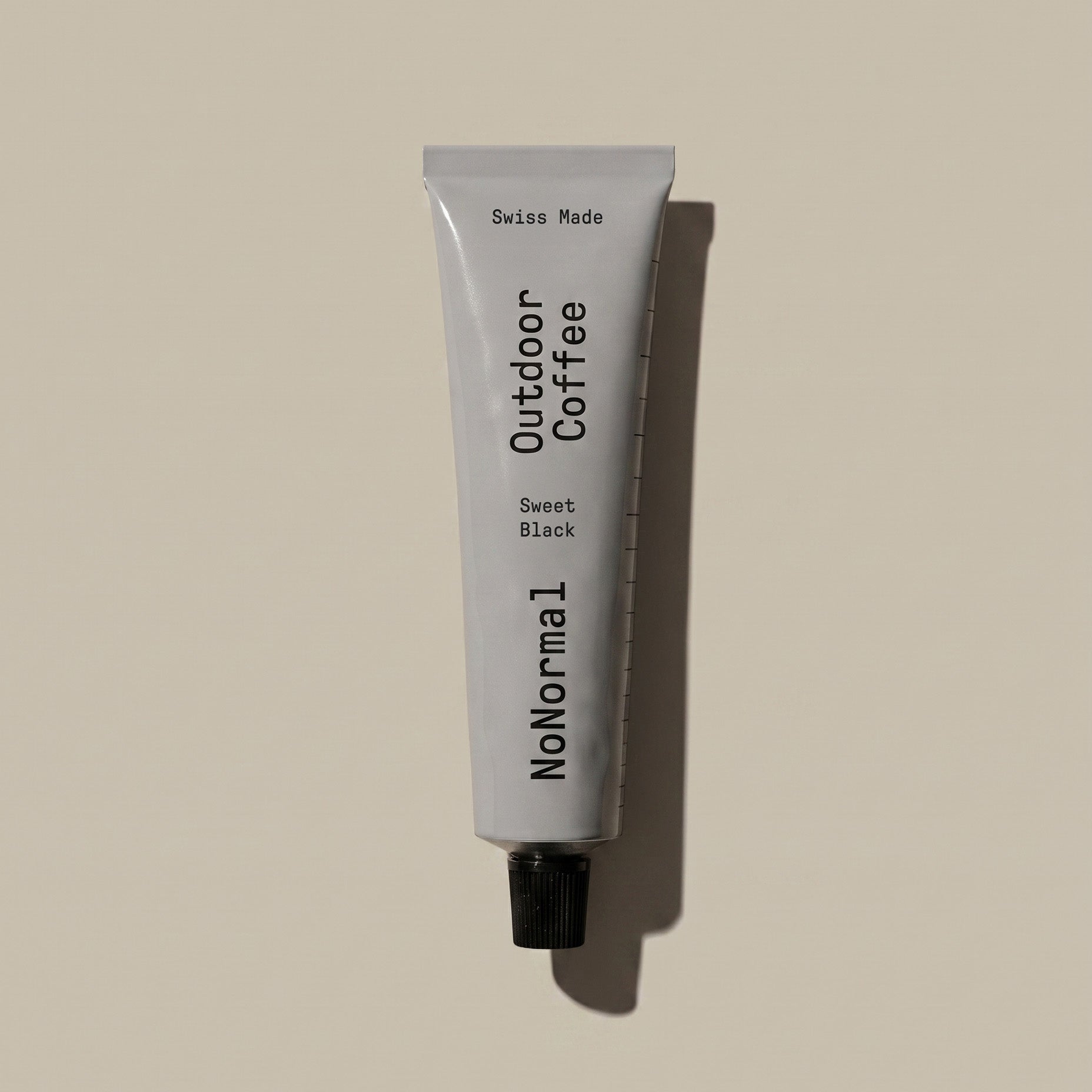NoNormal Sweet black tube on a grey background