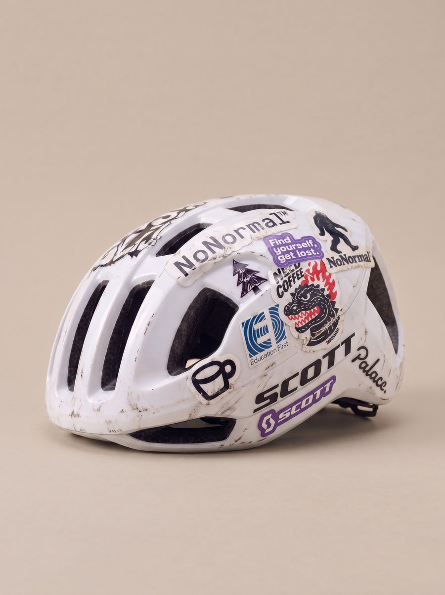 The booklet sleeve, Enter the world of Gravel, beside the sticker sheet