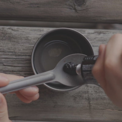 Squeeze NoNormal coffee paste into the titanium cup, stir with water, drink. Six seconds, no gear.